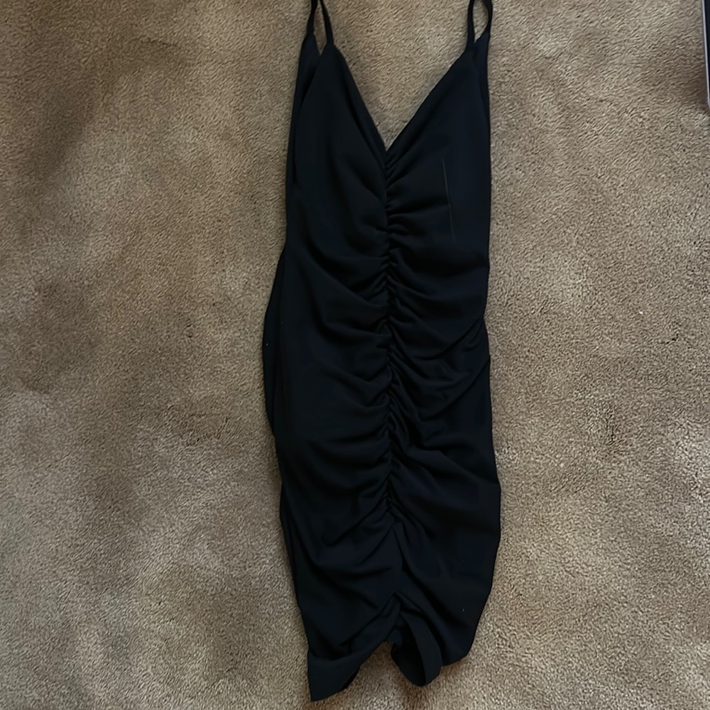 Black bodycon mini ruffle dress